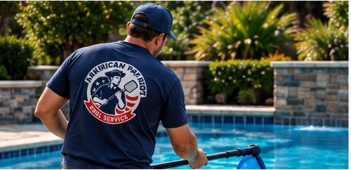 American Patriot Pool Service technician cleaning a residential pool