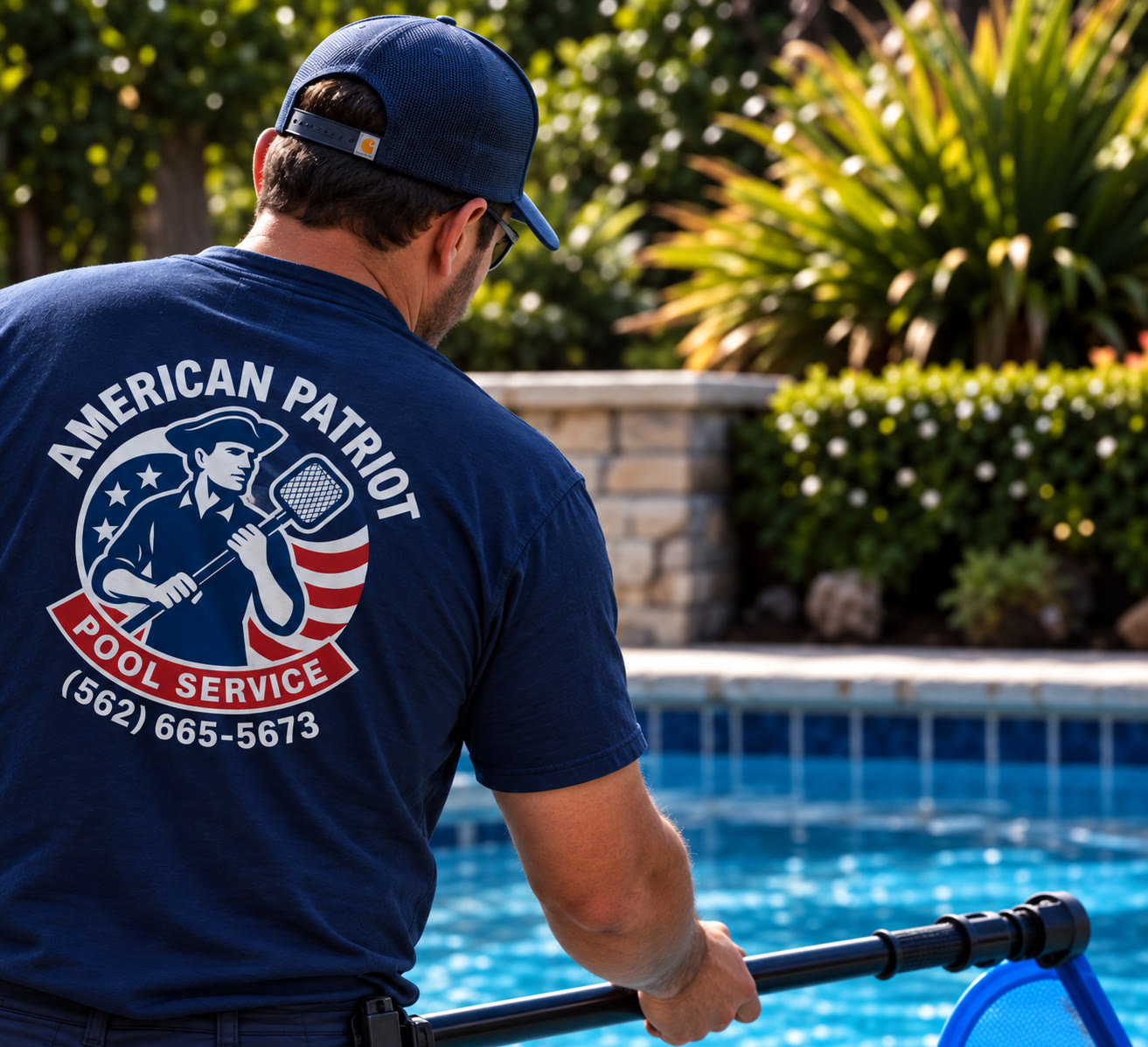 American Patriot Pool Service technician cleaning a residential pool
